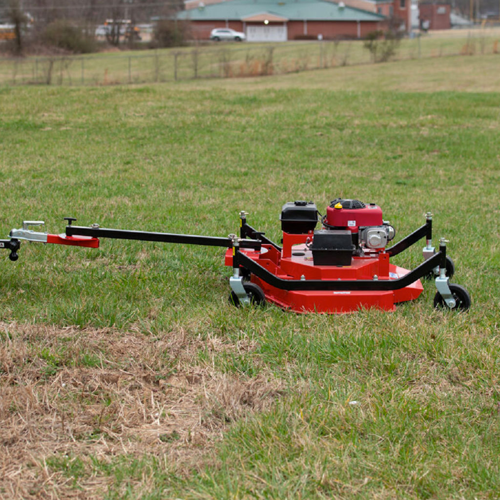 Titan Red Lawn Mower on field