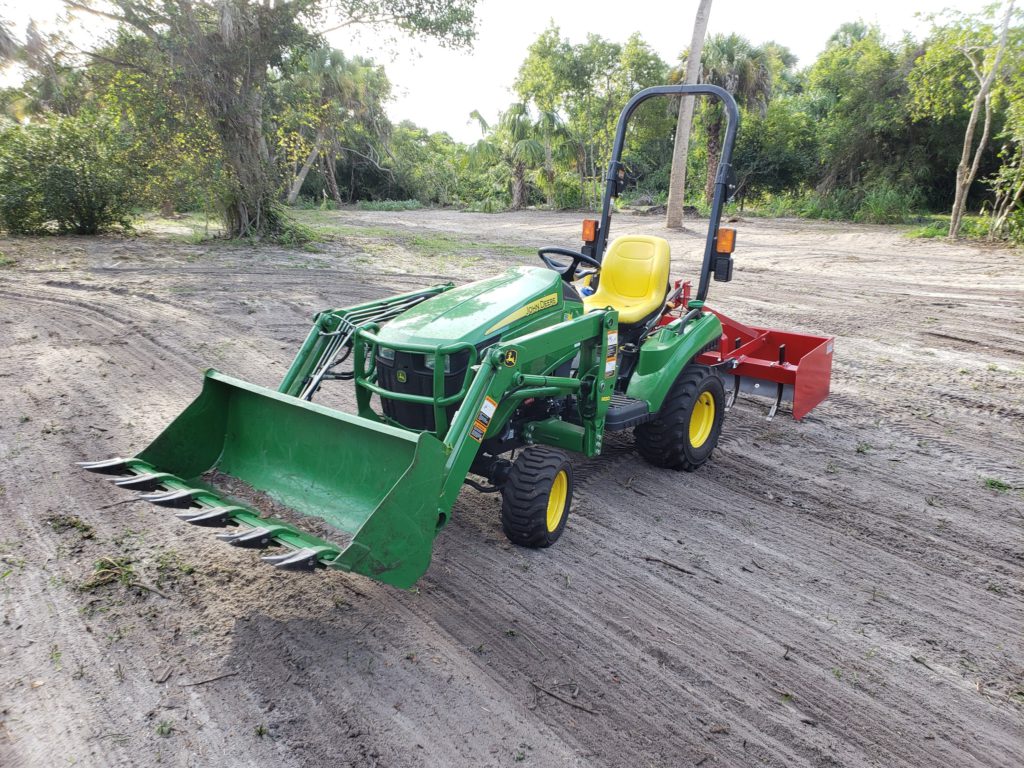 Tractor with Blade Implement