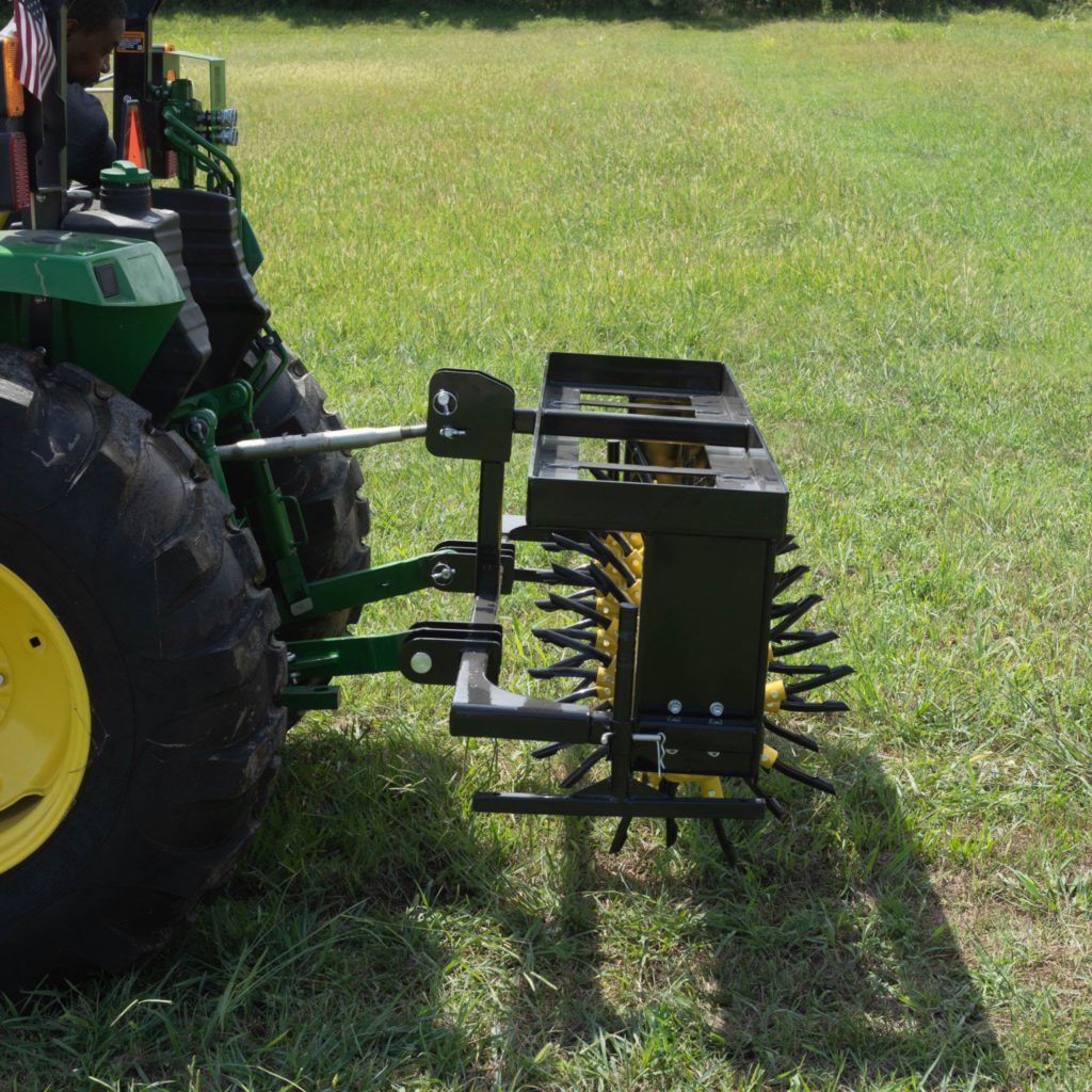 Titan Attachments on a Drum Plug Aerator