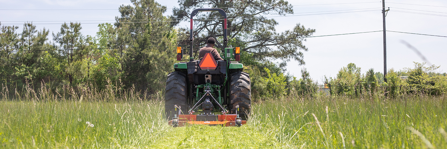 tractor cutting grass