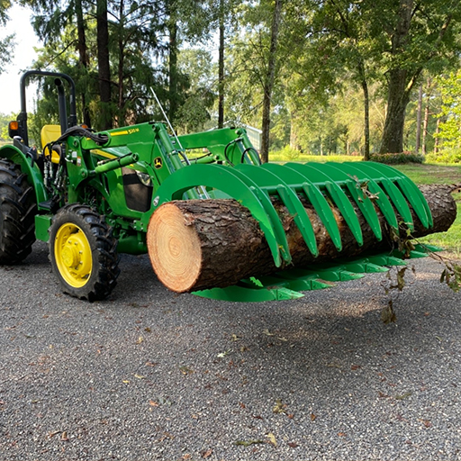 tractor carrying a large log